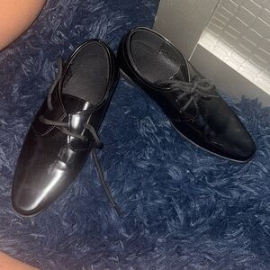 Black dress shoes worn while on a cruise